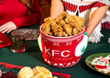 The KFC Finger Lickin’ Chicken Mitten Bucket Hugger is winter’s hottest dining accessory, and starting Nov 9 through Nov 11, anyone who orders a qualifying KFC bucket meal on KFC.com or the KFC app can get a free Finger Lickin’ Chicken Mitten Bucket Hugger, while supplies last.